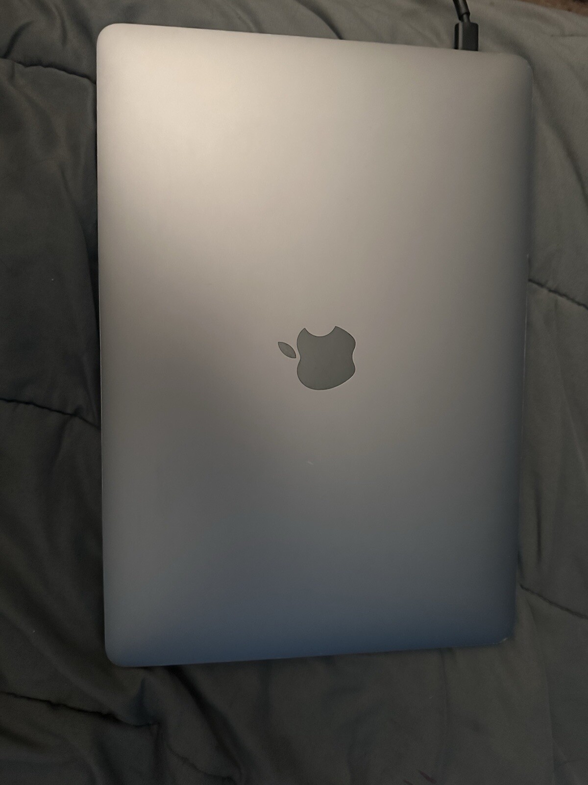 Used Apple MacBook Pro 13″ (256GB SSD). scratches and dents, but works very good