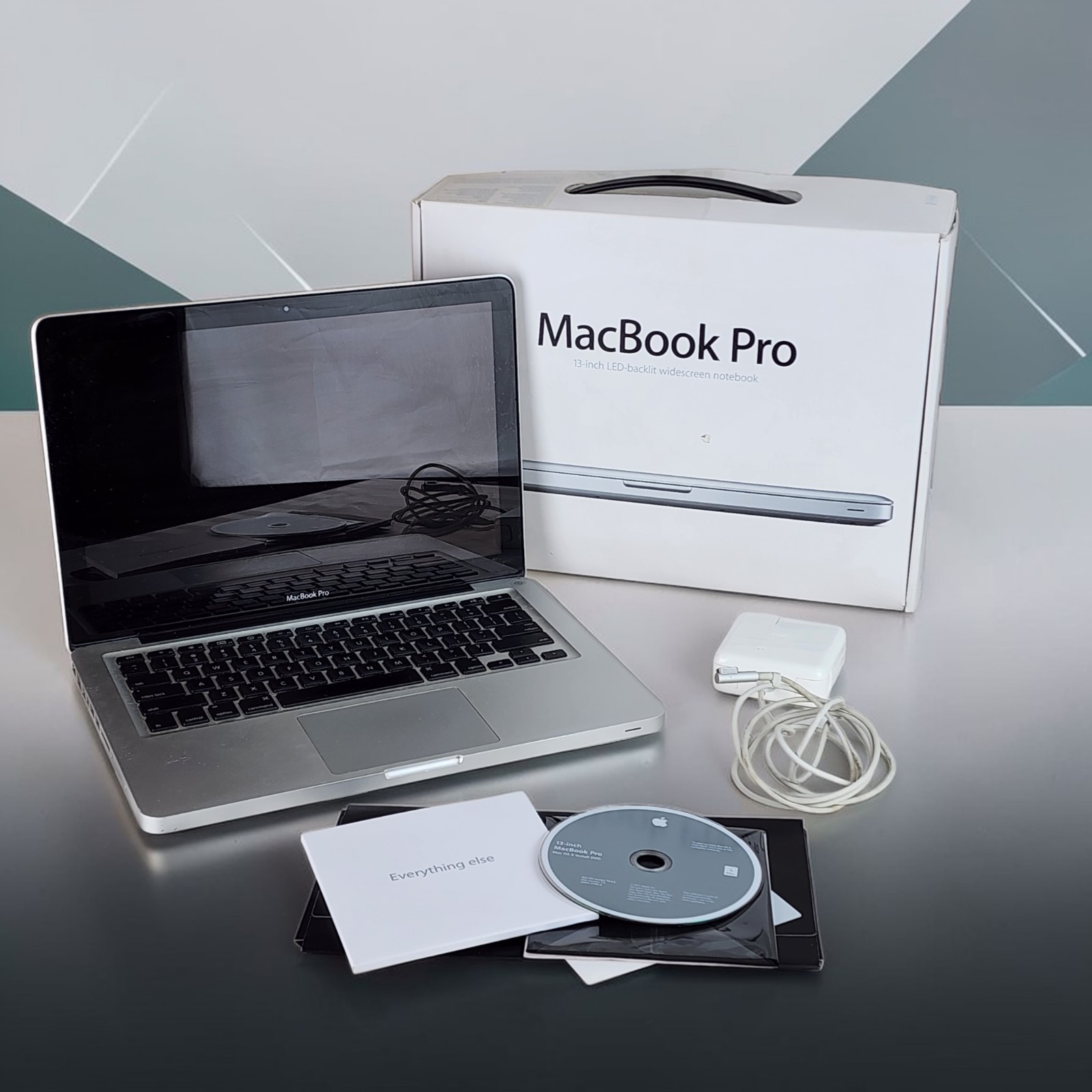 Apple MacBook Pro 13″ A1278, Powers on, See Error Message, +Accessories Plug CD