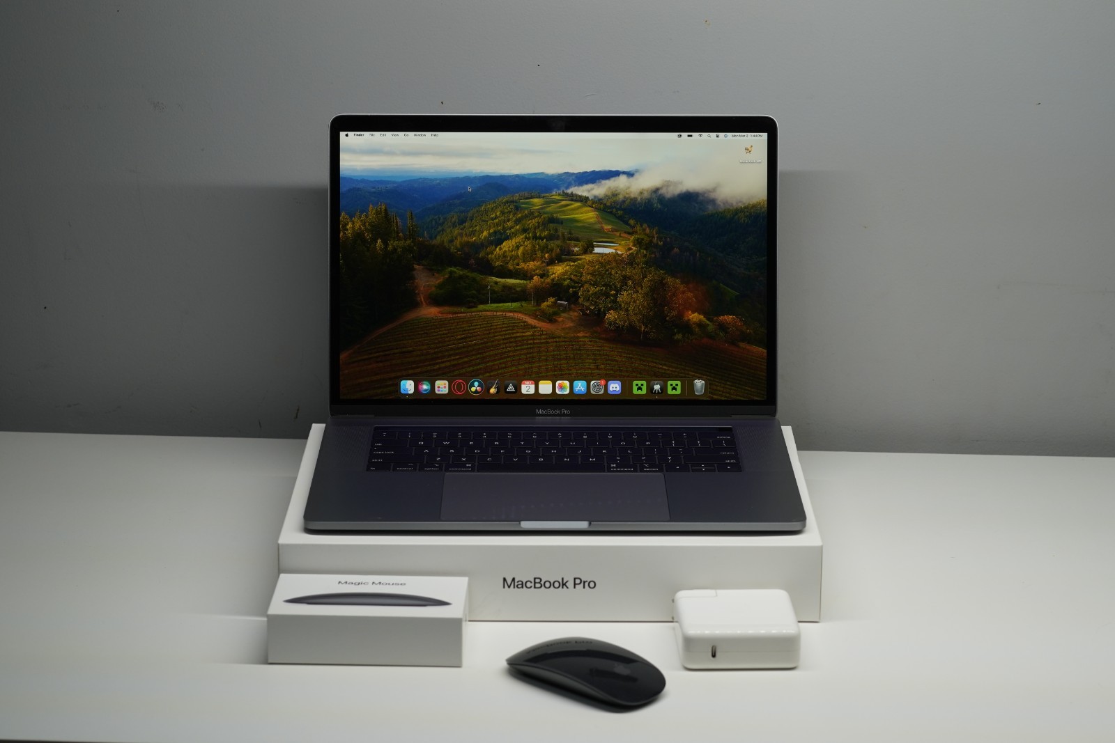 MacBook Pro 15-inch, 2019 8-Core 16GB RAM 512GB SSD Space Gray – w/ Magic Mouse